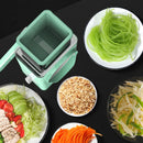 Vegetable spiralizer with various spiralized vegetables on a black background
