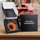 Knife sharpener in open packaging with 'Rolling Sharpener' box on a wooden surface.