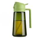 Green glass bottle with a green lid and handle on a white background